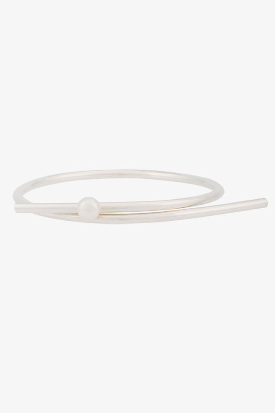 <p>If you're all about minimalist jewellery that still manages to make a statement, look to Swedish designer Sara Robertsson.</p><p><em>Silver bangle, £265, Sara Robertsson at Browns</em></p><p><a rel="nofollow noopener" href="https://www.brownsfashion.com/uk/shopping/circum-bracelet-with-pearl-11959096" target="_blank" data-ylk="slk:BUY NOW;elm:context_link;itc:0;sec:content-canvas" class="link ">BUY NOW</a><br></p>