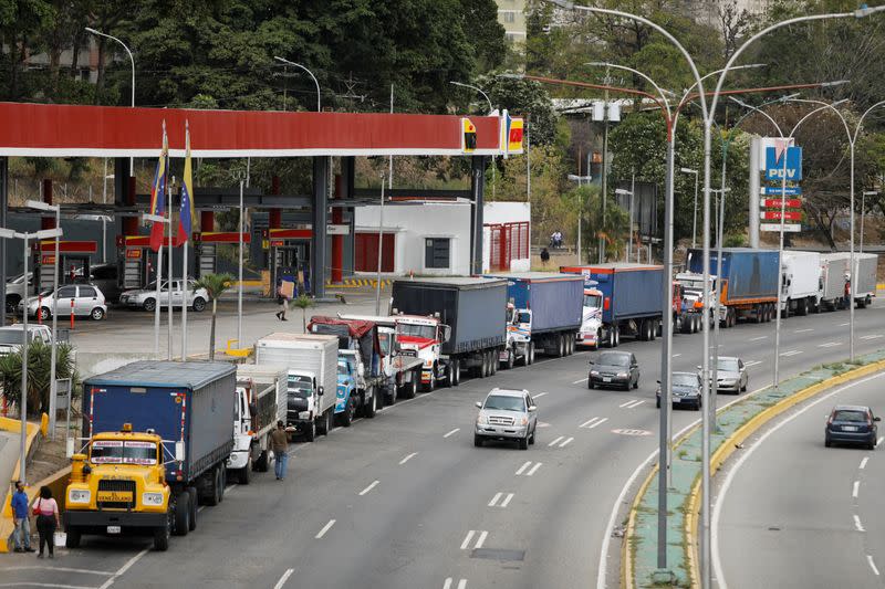 FILE PHOTO: Venezuelan truckers wait in long lines for fuel amid diesel shortages