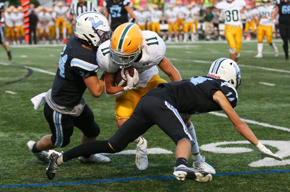 Morris Knolls' Kyle Hardie tries to break pass Parsippany Hills' defense during the first half of a football game against Parsippany Hills at Parsippany Hills High School September 09, 2022. Alexandra Pais | Daily Record