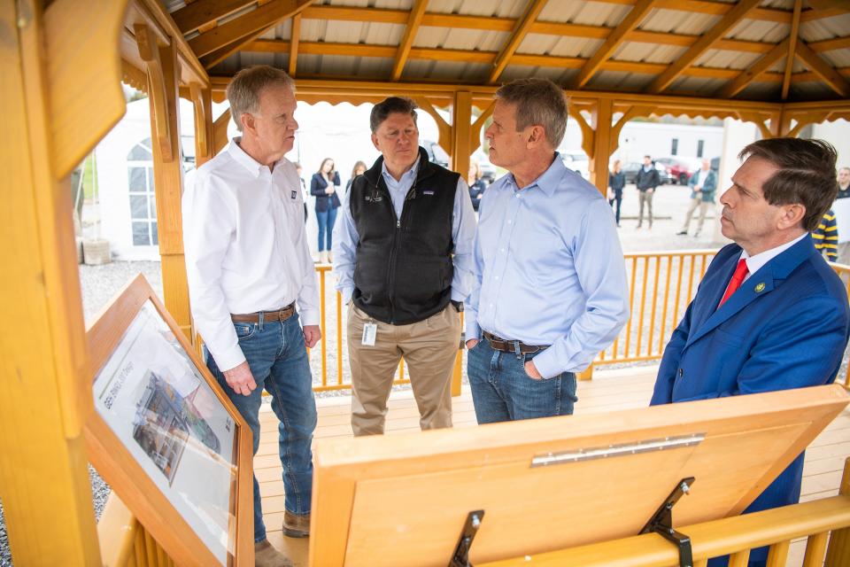Bob Deacy, senior vice president of the Clinch River Site, at left, speaks with Tennessee Gov. Bill Lee while touring TVA's proposed Clinch River nuclear project site in Kingston on March 3. TVA CEO Jeff Lyash, second from left, and Congressman Chuck Fleischmann, right, were also in attendance.