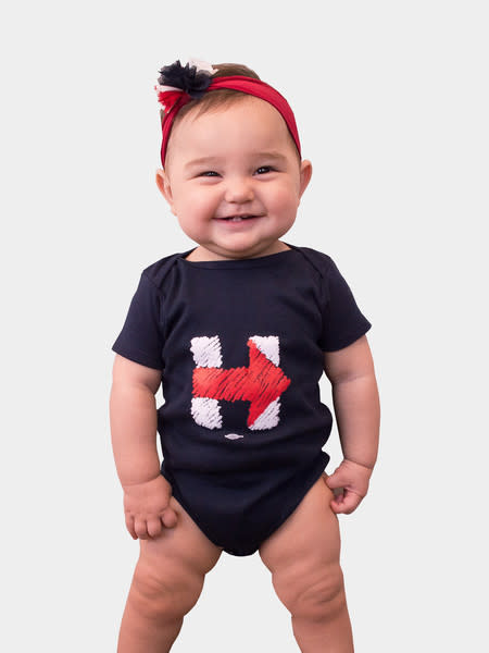 Babies might not be eligible to vote, but that doesn’t mean they can’t support their favorite candidate (or their parents’ pick). This navy blue onesie is unisex and simple in its design, perfect for any future democratic.