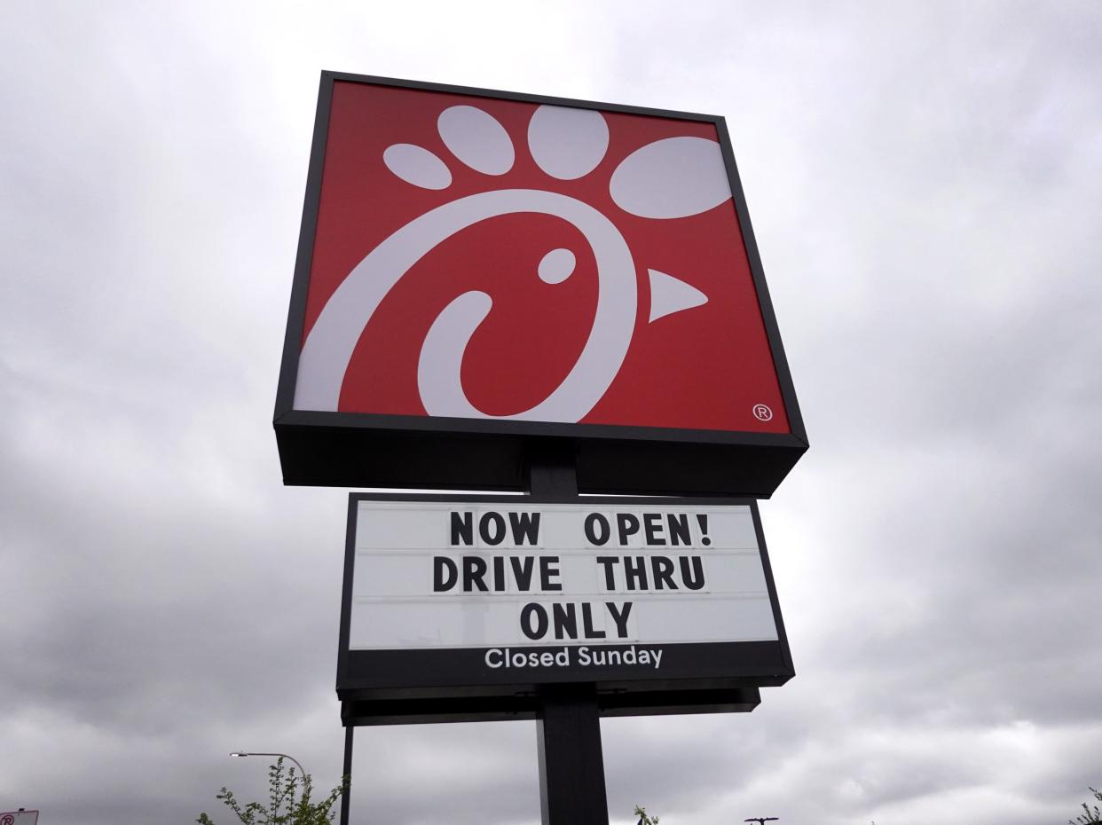 <p> A sign hangs outside of a Chick-fil-A restaurant on 6 May 2021 in Chicago, Illinois</p> (Getty Images)