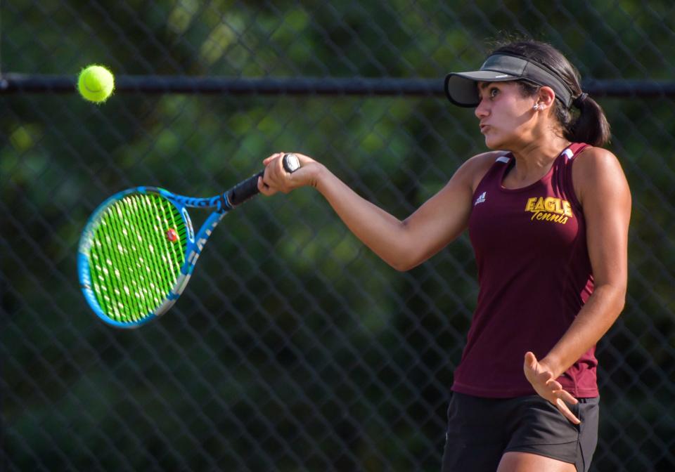 Dunlap's Maya Baman shows some intensity as she hits the ball against Morton's Regan Knapp during a girls tennis match Tuesday, Sept. 19, 2023 at Dunlap High School.