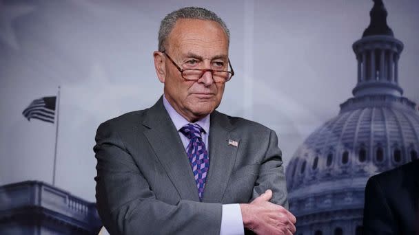 PHOTO: Senate Majority Leader Chuck Schumer listens during a news conference following a closed-door caucus lunch, at the Capitol in Washington, July 19, 2022. (J. Scott Applewhite/AP)