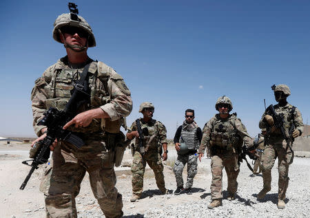 U.S. troops patrol at an Afghan National Army (ANA) Base in Logar province, Afghanistan August 7, 2018. REUTERS/Omar Sobhani/Files
