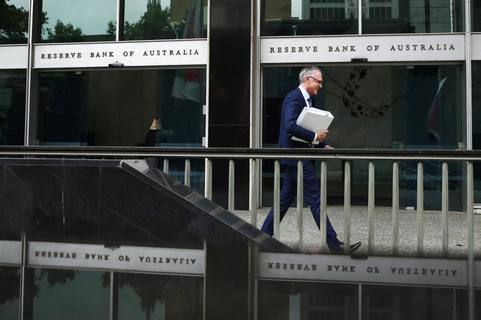 A man exits the Reserve Bank of Australia (RBA) headquarters in Sydney, Australia, on Monday, Dec. 4, 2017. Australia’s central bank is on track for its longest stretch of unchanged interest rates as it bets a tightening job market will begin to put upward pressure on wages — at some stage. Photographer: Brendon Thorne/Bloomberg