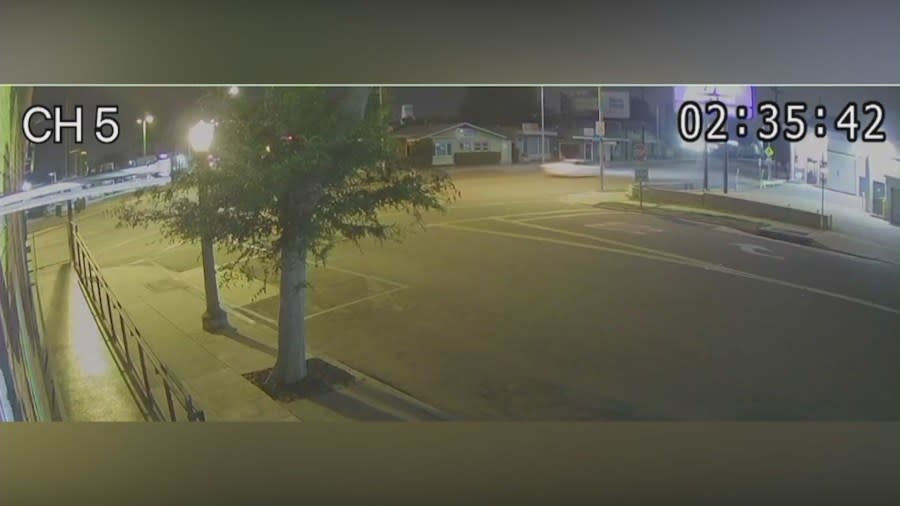 Surveillance video shows the white Tesla speeding in the area moments before the crash occurred in Pasadena on May 11, 2024. (KTLA)