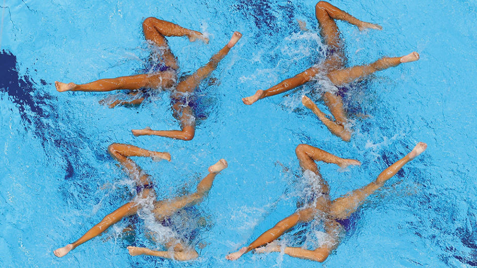 Artistic swimmers at the Tokyo 2022 Olympics - Credit: Stefan Wermuth/Reuters