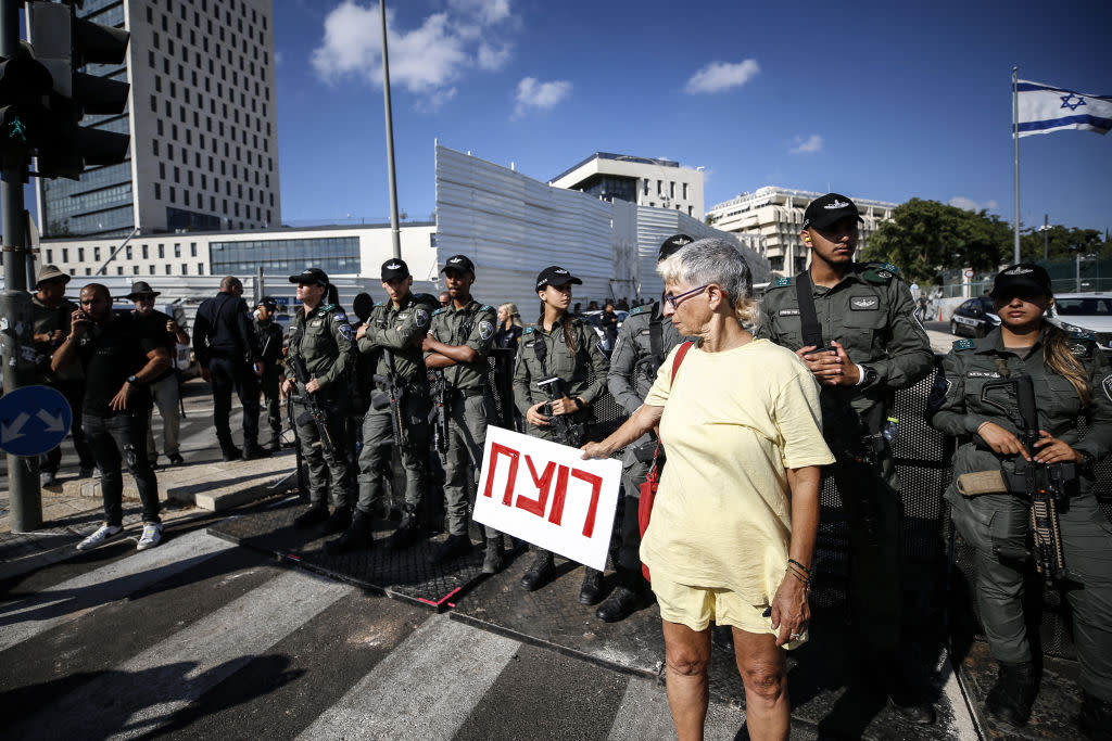 A demonstrator holds a “murderer” sign in West Jerusalem on Sept. 1, 2024.<span class="copyright">Saeed Qaq—Anadolu/Getty Images</span>