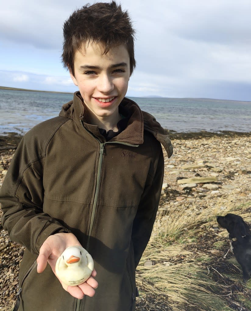 Filip Miller, 13, stumbled across the plastic duck while walking his dogs — and brought it back home to his mom, Marion, who spotted the telltale writing on the toy. Marion Miller / SWNS