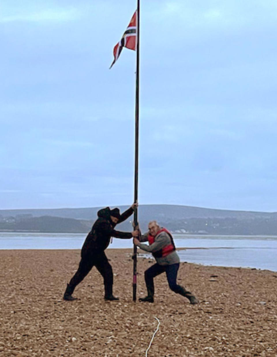 Sailors Chris Fox and Nick Ryley have claimed the isle by painting a flag of the Royal Lymington Yacht Club in Hampshire and planting it in the middle of the shingle bank. (Solent)