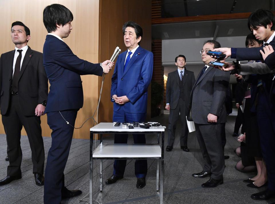 Japan's Prime Minister Shinzo Abe speaks to media about the projectile that North Korea launched Thursday, Nov. 28, 2019, in Tokyo. (Kyodo News via AP)