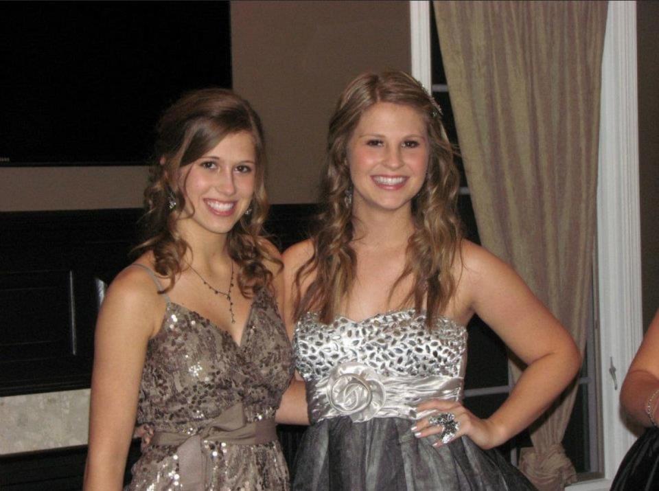 Mallory Gritsch, left, and Bri Buzick at their winter formal during their freshman year at Pella High School.