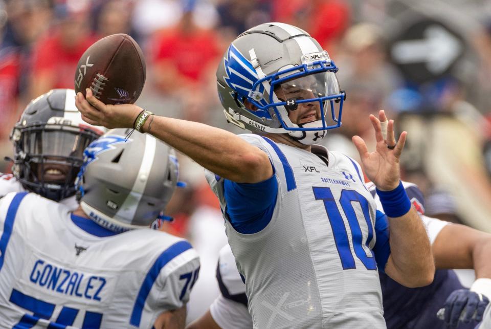 A.J. McCarron warms up in Houston for a game last season.