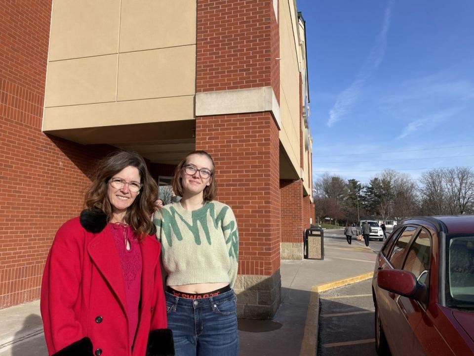 Dianna Hicks, 54, and Fay Hicks, 20, of Lansing are pictured outside of a grocery store on Feb. 6, 2023.