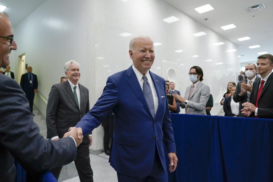 President Joe Biden arrives to speak at the Central Intelligence Agency headquarters in Langley, Va., Friday, July 8, 2022. Central Intelligence Agency Director William Burns follows second from left. (AP Photo/Susan Walsh)