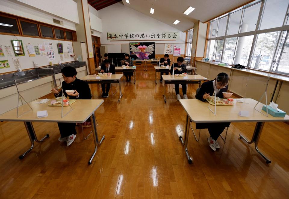 Last supper: having their final school lunch with teachers before graduation (Reuters)