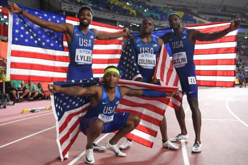 The USA's 4x100m relay team celebrate their gold medal