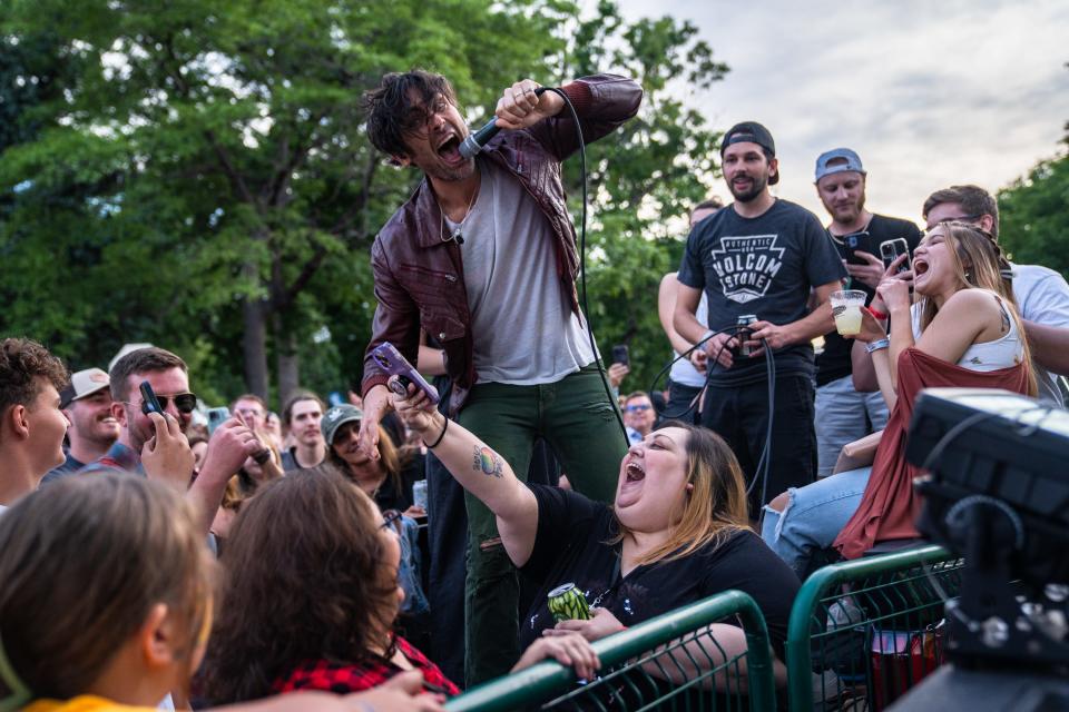 The All-American Rejects lead singer Tyson Ritter sings from a truckbed on June 10 in the crowd during a performance at Taste of Fort Collins.