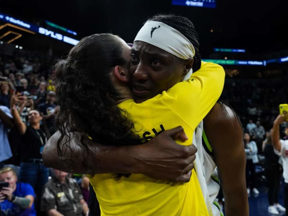 Sylvia Fowles, right, and Sue Bird embrace on Aug. 12, after their final WNBA game against each other. (David Berding/Getty Images - image credit)