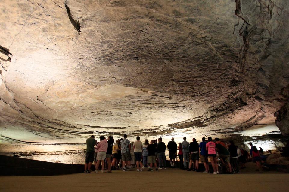 Tour participants stand in the rotunda area of Mammoth Cave.