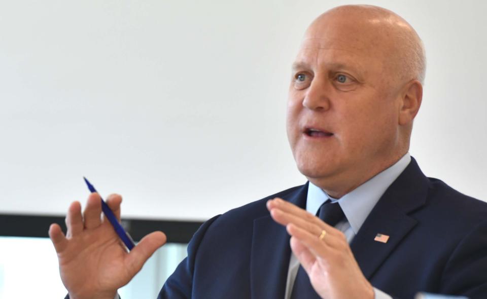 Mitch Landrieu, special adviser to the president, answers a reporter's question about bridge funding at Massachusetts Maritime Academy which hosted a meeting on Friday of federal, state and local officials to talk about construction of the new canal bridges.