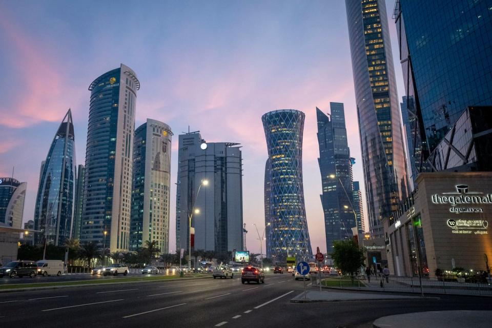 A view of hotels and other buildings at the West Bay area in Doha, Qatar, Thursday, Dec. 9, 2021. Many hotels in Qatar are already fully booked for the soccer World Cup which will be held in November and December 2022. Qatar's ambassador to Germany was personally urged to abolish his country's death penalty for homosexuality at a congress hosted by the German soccer federation on human rights in the World Cup host country.