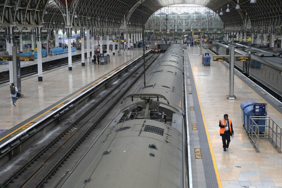 A quiet Paddington Station in London, as train services continue to be disrupted following the nationwide strike by members of the Rail, Maritime and Transport union in a bitter dispute over pay, jobs and conditions, in London, England, Thursday, June 23, 2022. (Ashlee Ruggels/PA via AP)