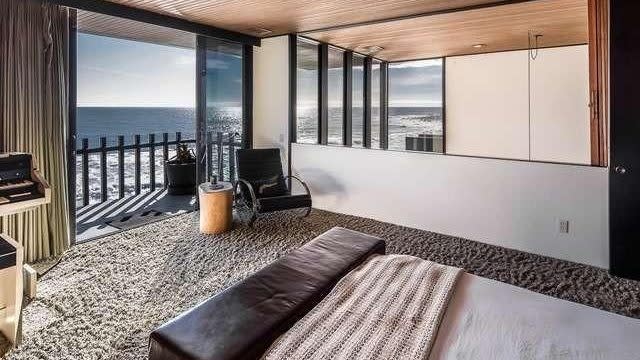 Master bedroom with deck overlooking the surf