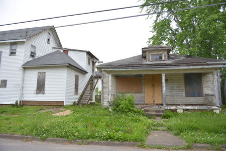 Dilapidated houses are seen in Huntington, West Virginia, May 4, 2017. REUTERS/Lexi Browning