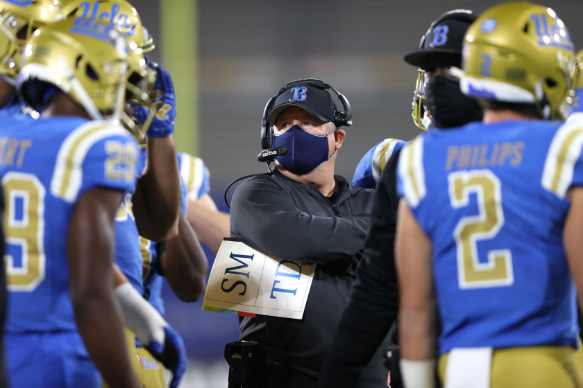 PASADENA, CALIFORNIA - DECEMBER 12: Head coach Chip Kelly of the UCLA Bruins looks on.