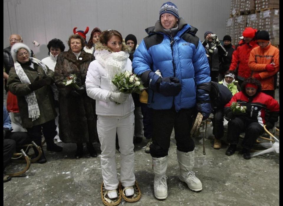 Chill Out: Czech polar explorer Vaclav Sura, right, took his cool hobby to new levels by marrying his bride, Martina Kolouchova in an industrial freezing box in Jirny, near Prague, on July 21, 2007. The temperature during their ceremony was a crisp minus 22 degrees Fahrenheit, but nothing Sura couldn't handle since he'd conquered an expedition to the North Pole two years prior to tying the knot. 