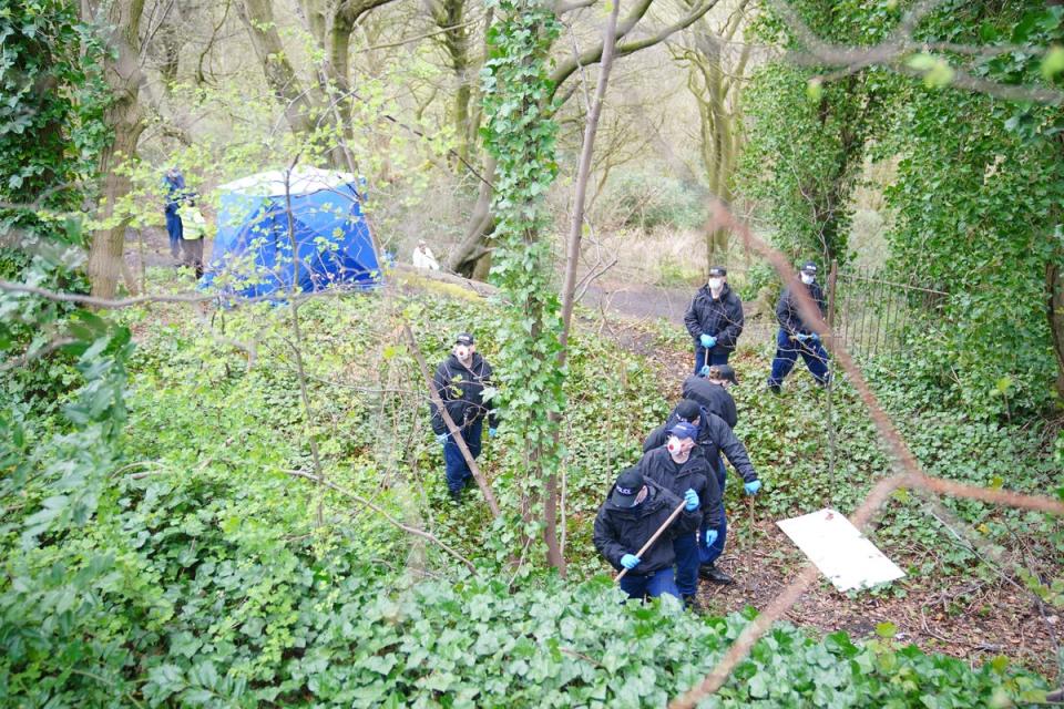 Police officers by a forensic tent at Kersal Dale, near Salford, Greater Manchester, where a major investigation has been launched (Peter Byrne/PA Wire)