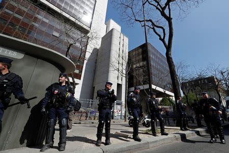 French police block the entrance of the Tolbiac university site, branch of Paris 1 university, after the evacuation of around 100 people who had occupied the university premises in protest against student admissions rules, in Paris, France, April 20, 2018. REUTERS/Gonzalo Fuentes