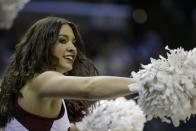 Stanford cheerleaders perform against Dayton during the first half in a regional semifinal game at the NCAA college basketball tournament, Thursday, March 27, 2014, in Memphis, Tenn. (AP Photo/Mark Humphrey)