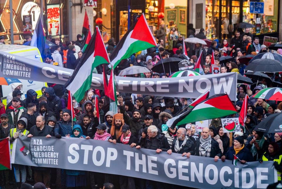 People take part in a march and demonstration in Glasgow (Jane Barlow/PA Wire)