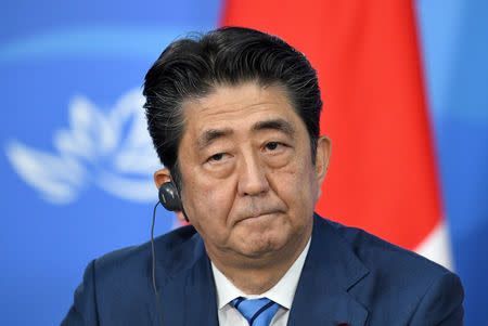 FILE PHOTO: Japanese Prime Minister Shinzo Abe attends a joint news conference on the sidelines of the Eastern Economic Forum in Vladivostok, Russia September 10, 2018. Donat Sorokin/TASS Host Photo Agency/Pool via REUTERS