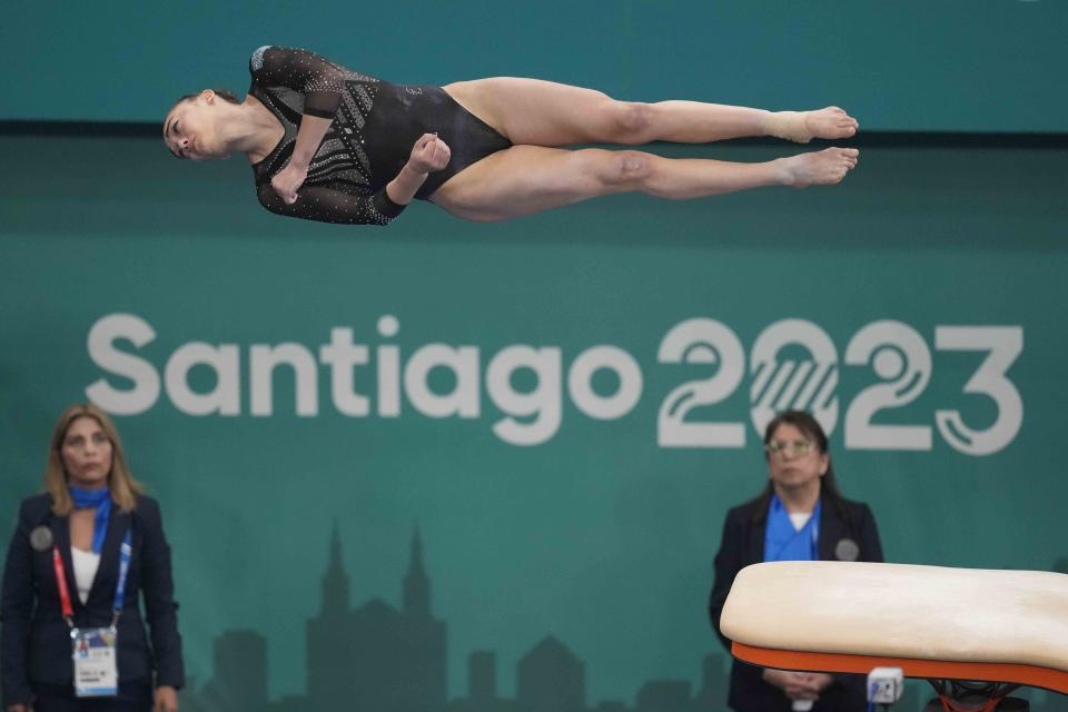 Argentina's Milagros Curti competes on the vault during the women's team artistic gymnastics final round at the Pan American Games in Santiago, Chile, Sunday, Oct. 22, 2023. (AP Photo/Martin Mejia)