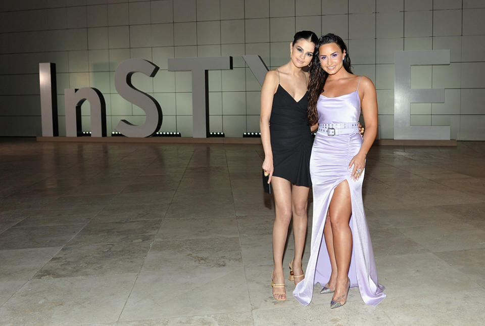 <p>The Disney Channel alums — and childhood pals — showed lots of leg as they reunited at the 2017 <em>InStyle</em> Awards on Monday. Demi had the honor of accepting the Advocate award, while the “Fetish” singer was on hand to present Hung Vanngo with the Makeup Artist of the Year trophy. (Photo: Donato Sardella/Getty Images for InStyle) </p>