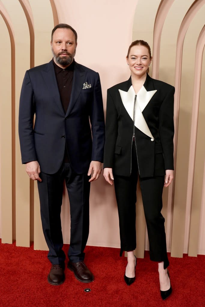 Yorgos Lanthimos and Emma Stone attend the 96th Oscars Nominees Luncheon at The Beverly Hilton on February 12, 2024 in Beverly Hills, California