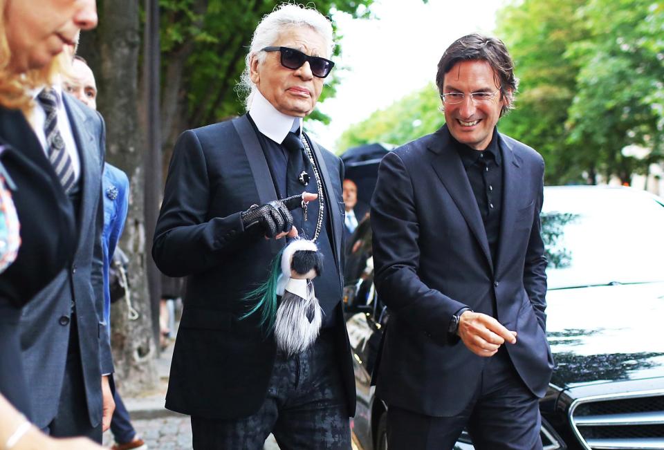 Karl Lagerfeld with his furry “Karlito” bag charm