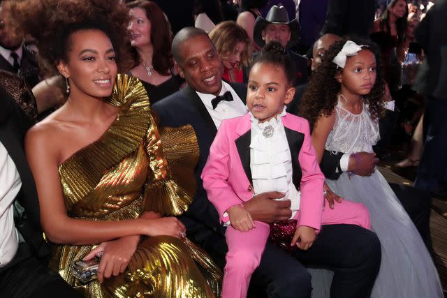 Christopher Polk/Getty Images for NARAS Solange, JAY-Z and his daughter Blue Ivy Carter seated at the 59th Grammy Awards at the Staples Center on Feb. 12, 2017, in Los Angeles.