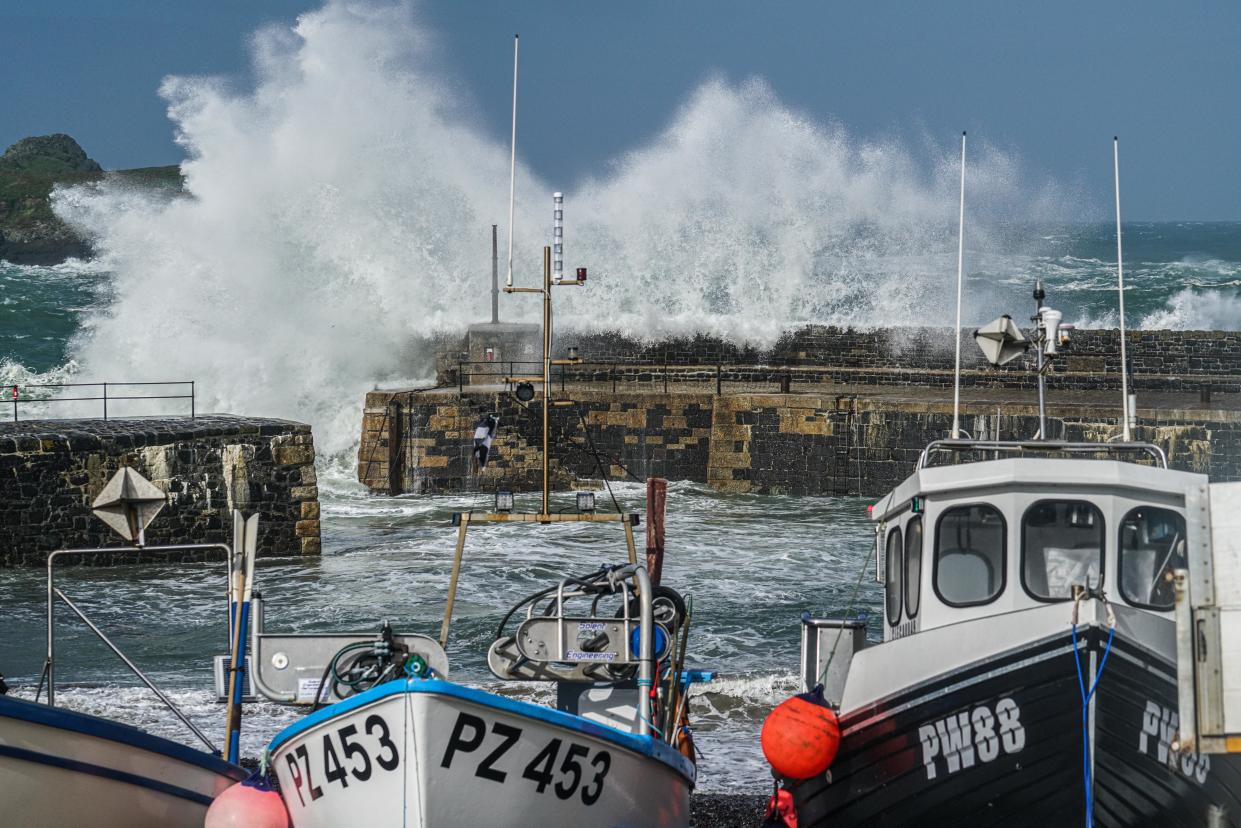 MULLION COVE, CORNWALL - AUGUST 21: Waves cased by Storm Ellen strike the National Trust-owned harbour on August 21, 2020 at Mullion Cove, Cornwall, United Kingdom. The Met Office extended a weather warning for a further twenty-four hours as Storm Ellen continued to blow. (Photo by Hugh R Hastings/Getty Images)