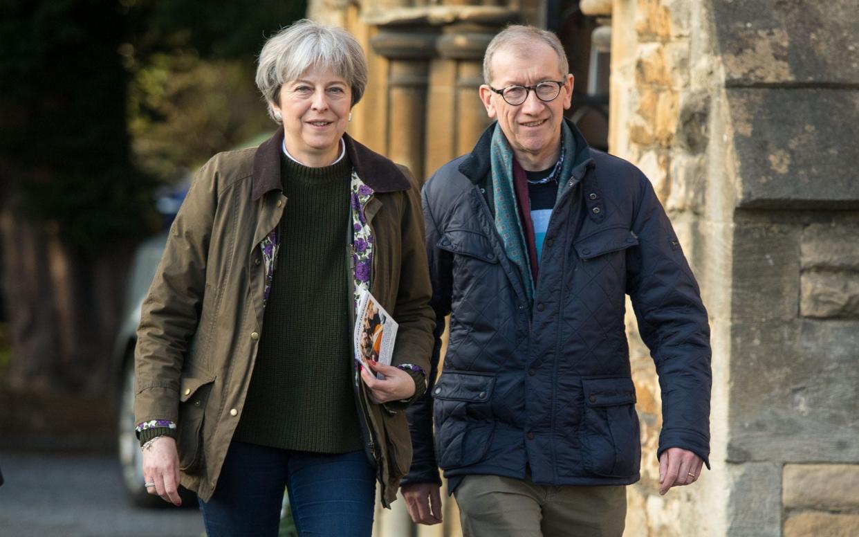 Prime Minister Theresa May and her husband Philip, leave a church in her Maidenhead constituency - PA
