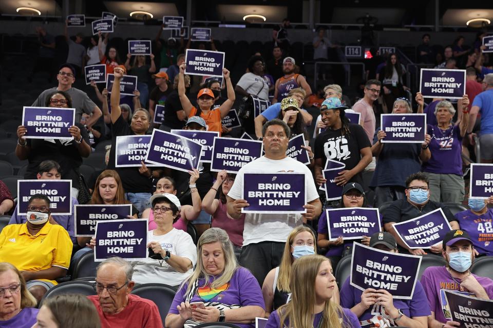 Supporters hold up signs reading "Bring Brittney Home" during a rally to support the release of detained American professional athlete Britney Griner at Footprint Center on July 06, 2022 in Phoenix, Arizona. WNBA star and Phoenix Mercury athlete Brittney Griner was detained on February 17 at a Moscow-area airport after cannabis oil was allegedly found in her luggage.