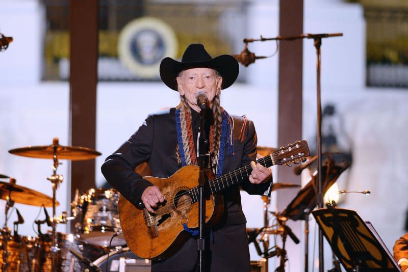 Willie Nelson performs at "A Salute to the Troops: In Performance at the White House" concert on the South Lawn in 2014 in Washington. File Photo by Olivier Douliery/Pool