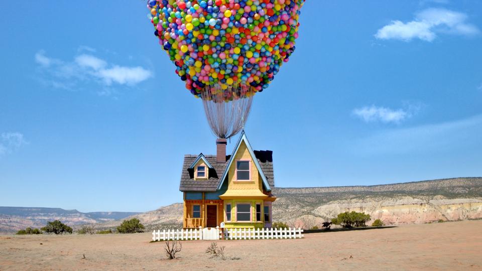 Check out this whimsical Icon Airbnb experience. pictured: a recreated house from the animated film "Up"
