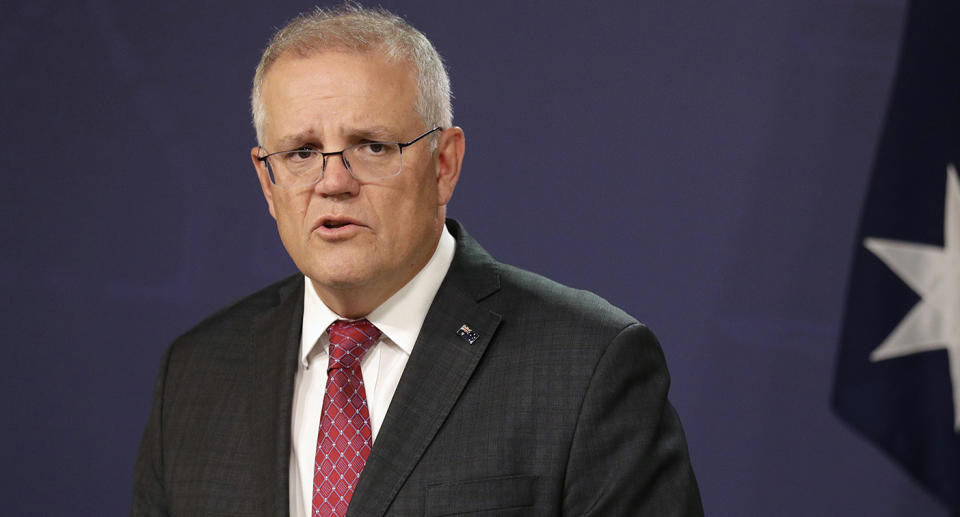 Australia's Prime Minister Scott Morrison comments at a press conference in Sydney, Australia, Tuesday, April 27, 2021, after reports of a senior Australian security bureaucrat warned his staff that free nations 