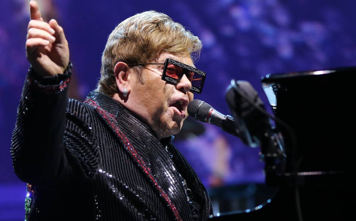 Elton John performs “Rocket Man” during his Farewell Yellow Brick Road tour to a packed house at the Colonial Life Arena.
