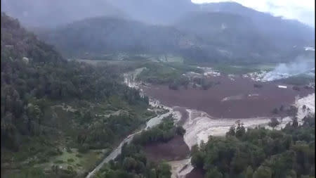 Damage done by a landslide is seen in Villa Santa Lucia, Los Lagos, Chile December 16, 2017 in this still image obtained from social media. CARABINEROS DE CHILE/via REUTERS